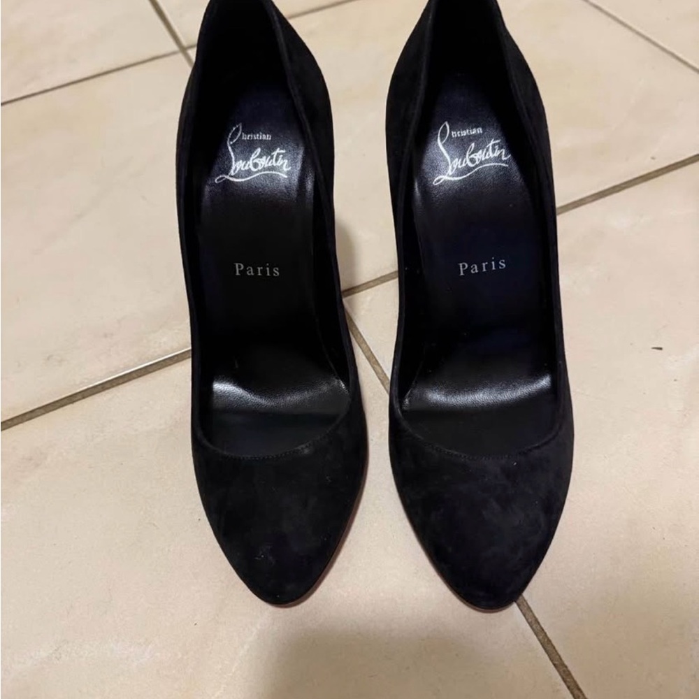 Christian Louboutin Elegant Black Heels. Never worn. Run a little small.